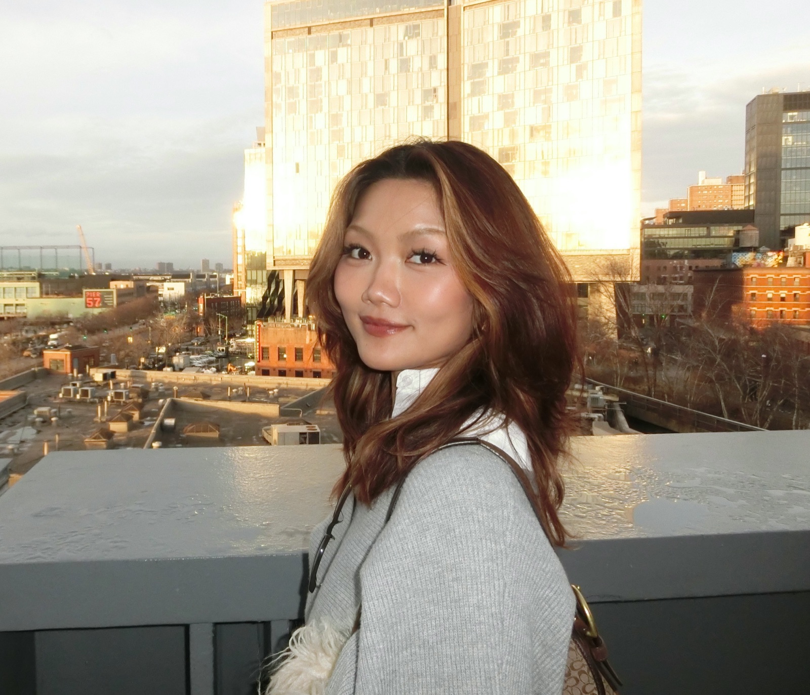 Scarlett Wang on a rooftop in New York at sunset